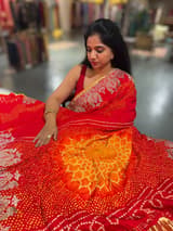 Orangish Red Designer Rai Bandhej Saree With Embroidered Border SS50484