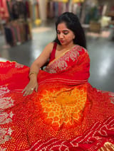 Orangish Red Designer Rai Bandhej Saree With Embroidered Border SS50484