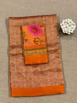 Orange Tissue saree with kanchi silk embroidered blouse
