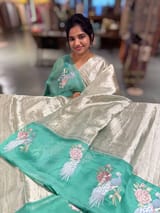 Pure Handloom Tissue saree with organza embroidered border