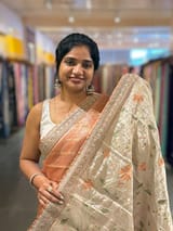 Peach Banarasi Tissue checks Saree with Sabyasachi Borders