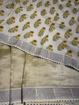 Pastel yellow Tissue Saree with pythani tissue embroidered border SS50541