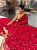 Dark Red Georgette Saree with stick on Badla in zigzag pattern