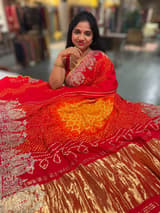 Orangish Red Designer Rai Bandhej Saree With Embroidered Border SS50484