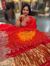 Orangish Red Designer Rai Bandhej Saree With Embroidered Border SS50484