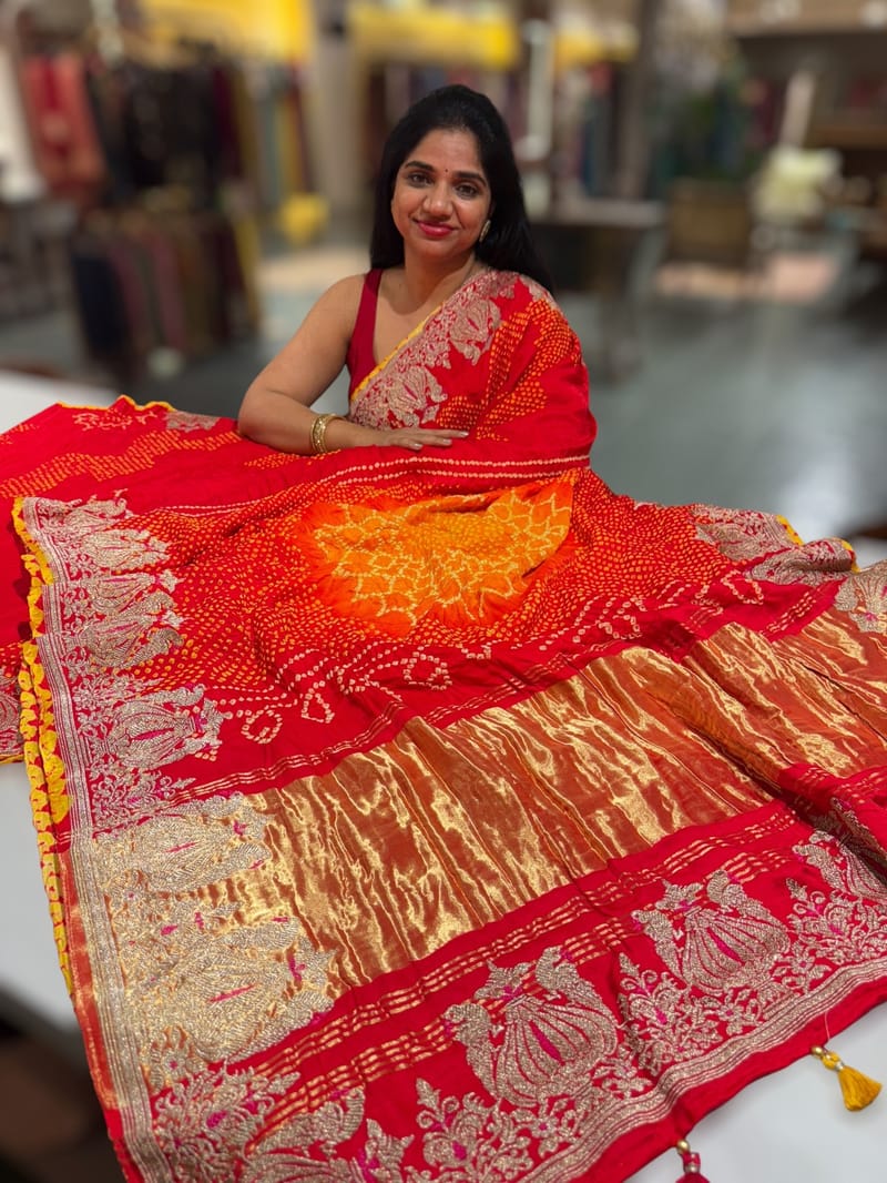 Orangish Red Designer Rai Bandhej Saree With Embroidered Border SS50484