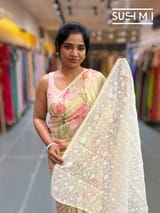 Pastel yellow printed georgette saree with handwork : S62F195
