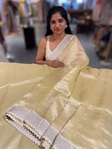 Pastel yellow Tissue Saree with pythani tissue embroidered border SS50541