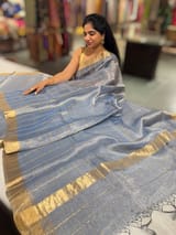 Blue tissue checks Saree with pythani inspired embroidered tissue blouse