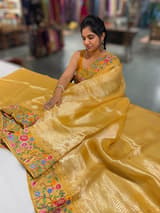 Mango yellow Tissue Stripes Saree with petite point Embroidered tissue border and blouse .