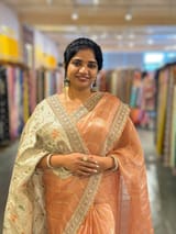 Peach Banarasi Tissue checks Saree with Sabyasachi Borders
