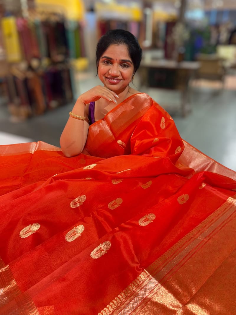 Dark Orange Premium Kora Banarasi Saree with heavy weaving borders and Raw mango style motifs