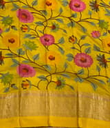 Yellow Tissue saree with kanchi silk embroidered blouse