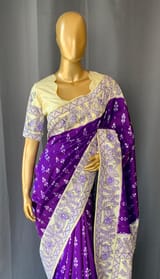 Violet ikkath patola saree with madhubani handpainting