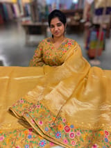 Mango yellow Tissue Stripes Saree with petite point Embroidered tissue border and blouse .