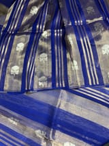 Royal Blue Banarasi Handloom Kora Tissue Stripes with allover kaduwa woven lotus  motifs .