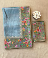 Blue Tissue Stripes Saree with petite point Embroidered tissue border and blouse . SS50424