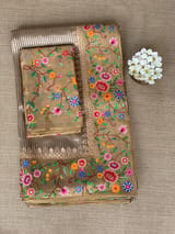 Earthy Tone Tissue Stripes Saree with petite point Embroidered tissue border and blouse .