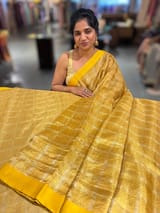 Yellow Tissue saree with kanchi silk embroidered blouse