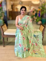 Mint Floral Printed Organza Saree With Chantilly Lace Style Embroidered Border.
