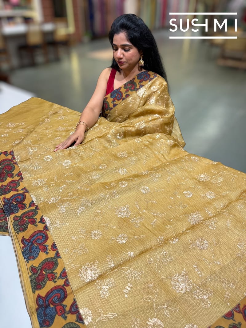 Light mustard Silk kota and pen kalamkari fusion saree with pita emb