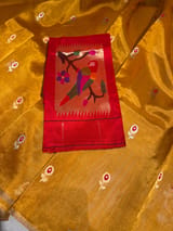 Orange Handloom Banarasi Tissue with meenakari sona rupa flower motifs