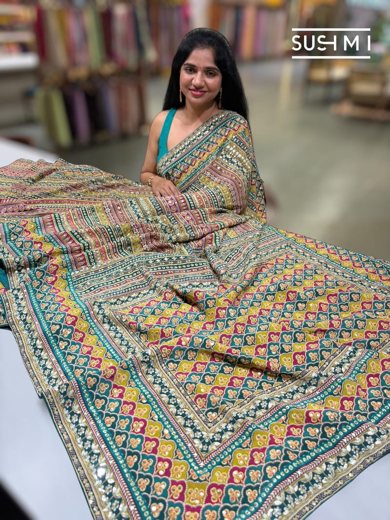 Printed crepe silk with allover sequnce : S62F129