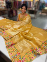 Mango yellow Tissue Stripes Saree with petite point Embroidered tissue border and blouse .