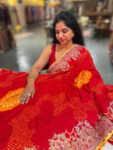 Orangish Red Designer Rai Bandhej Saree With Embroidered Border SS50484