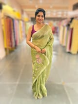 Light Olive Green Tissue Georgette Saree with petite point emb SS50112