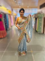 Blue Tissue Stripes Saree with petite point Embroidered tissue border and blouse . SS50424