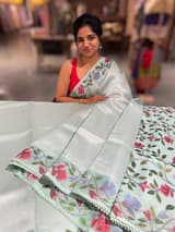 Mint kora tissue saree with pythani inspired embroidery