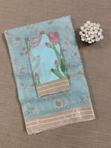 Baby Blue Muslin allover embroidered Saree with pichwai printed blosue