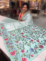 Mint kora tissue saree with pythani inspired embroidery