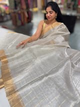 Silver tissue checks Saree with pythani inspired embroidered tissue blouse