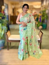 Mint Floral Printed Organza Saree With Chantilly Lace Style Embroidered Border.
