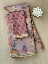 Mauve tissue saree in half and half style with floral and birds