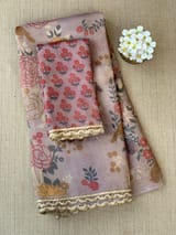 Mauve tissue saree in half and half style with floral and birds
