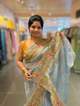 Blue Tissue Stripes Saree with petite point Embroidered tissue border and blouse . SS50424