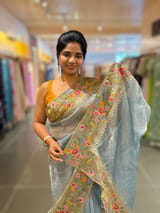 Blue Tissue Stripes Saree with petite point Embroidered tissue border and blouse . SS50424