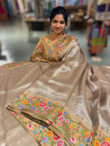 Earthy Tone Tissue Stripes Saree with petite point Embroidered tissue border and blouse .