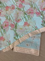 Baby Blue Muslin allover embroidered Saree with pichwai printed blosue