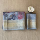 Dusty Blue Pure Handloom Chiniya Silk Saree with stunning Floral Print and zari borders SS50103