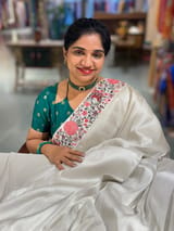 Half White Banarasi  brocade Silk Saree with Petite Point Embroidered Border. SS5087