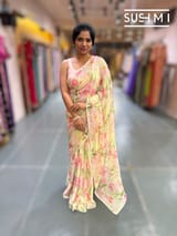 Pastel yellow printed georgette saree with handwork : S62F195