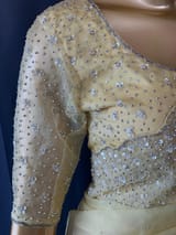 Pastel yellow organza handwork saree