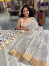 Silver tissue checks Saree with pythani inspired embroidered tissue blouse