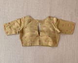 Gold tissue saree in half and half style