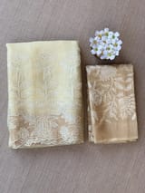 Pastel Yellow Organza Saree with tissue cutwork Rose border