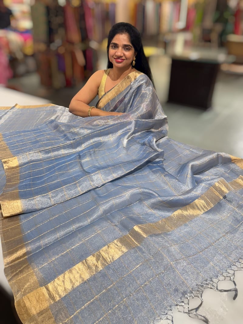 Blue tissue checks Saree with pythani inspired embroidered tissue blouse